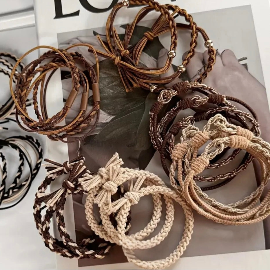 “Brown and beige boho braided hair ties styled on magazine background.”